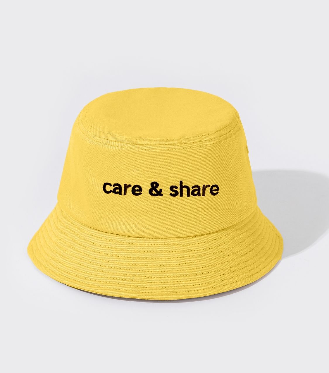 Mũ Bucket Hat thêu Care & Share Typo - Vàng